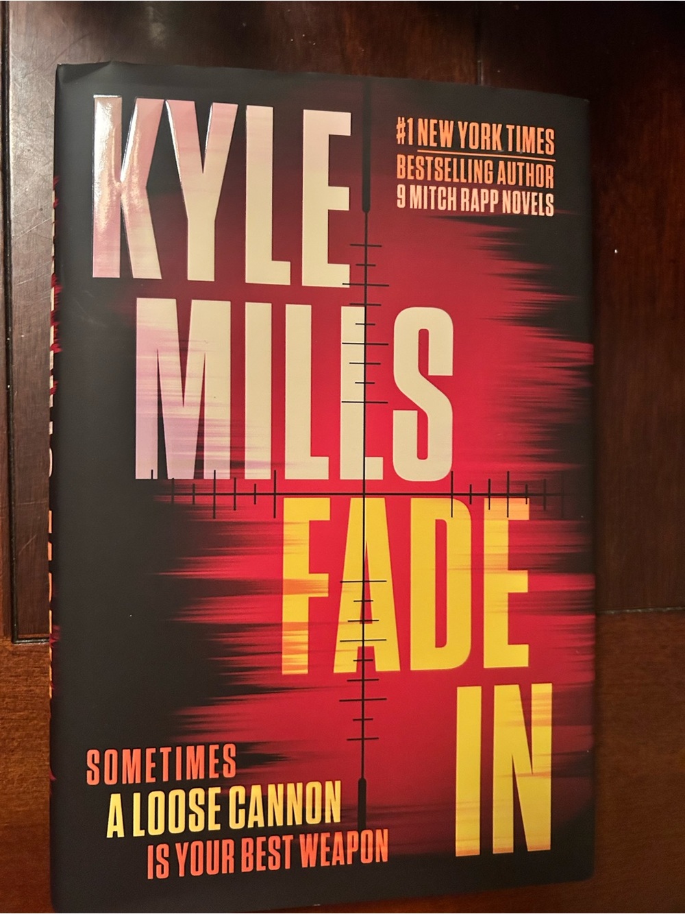 Kyle Mills Fade In Hardcover - Bold Red & Yellow Cover